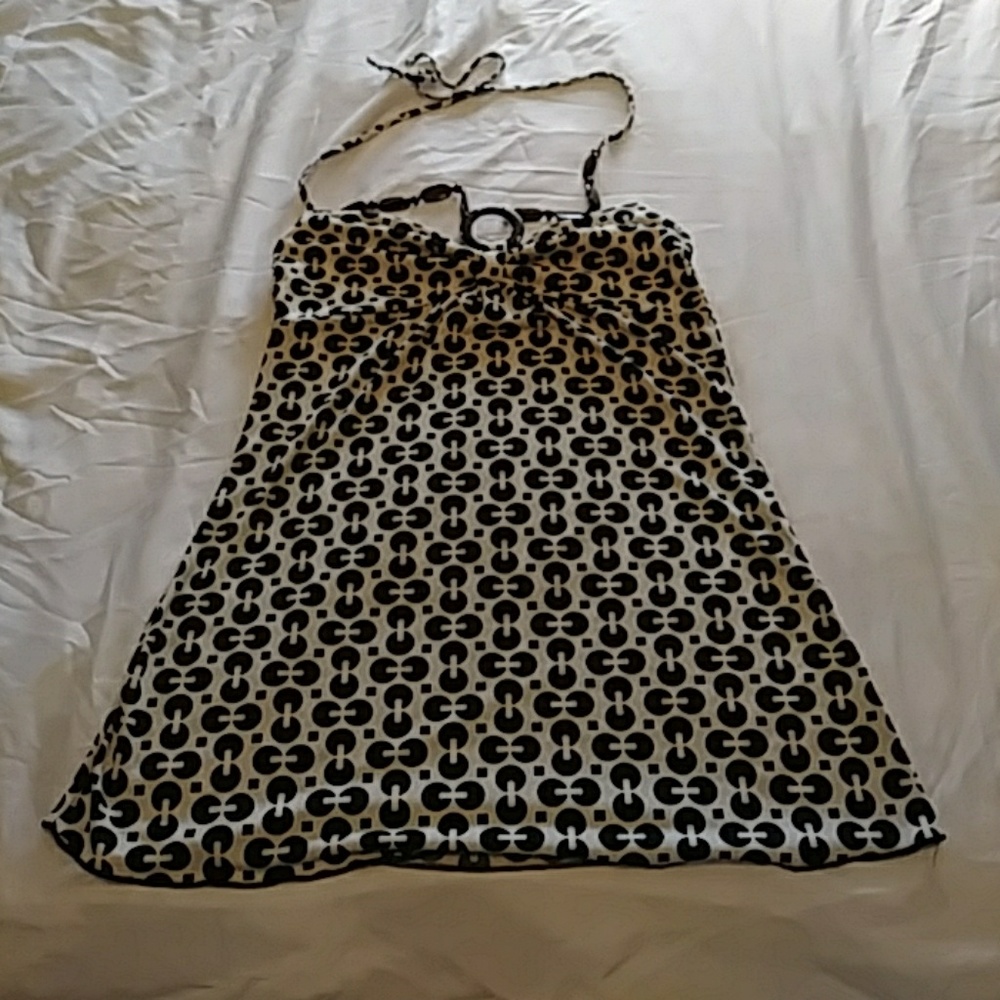 Top with jeweled tie strings. Dressy